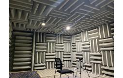 What is the standard decibel for an anechoic chamber?